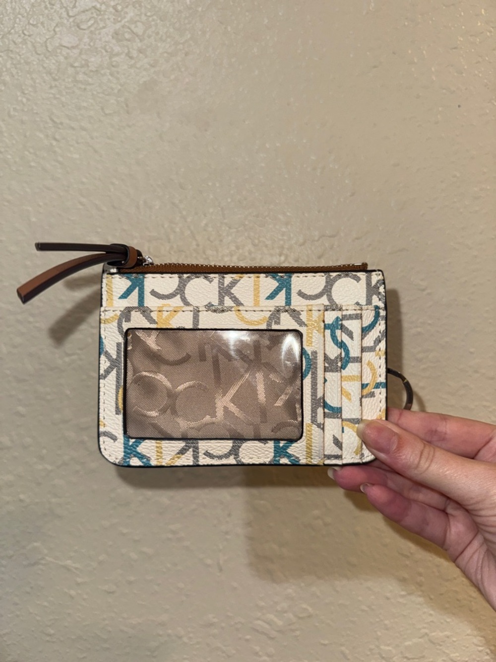 Calvin Klein Card ID Wallet in white with Teal & Mustard Accents